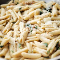 a close up of cavatelli in a skillet