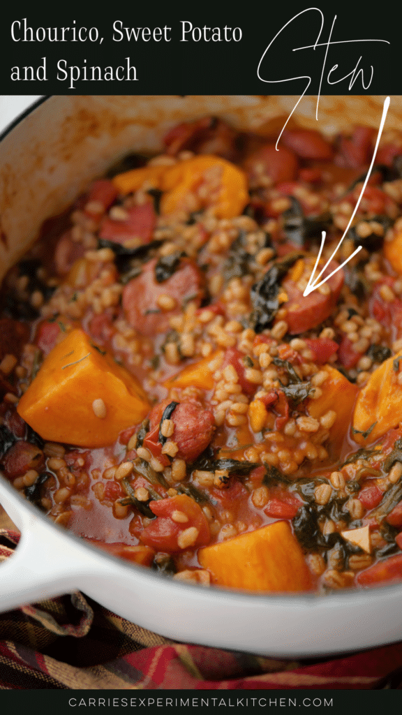 a pot of chourico, sweet potato and spinach stew