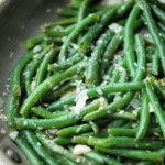 green beans with garlic in a skillet