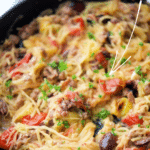 spaghetti squash nonna with italian sausage in a skillet