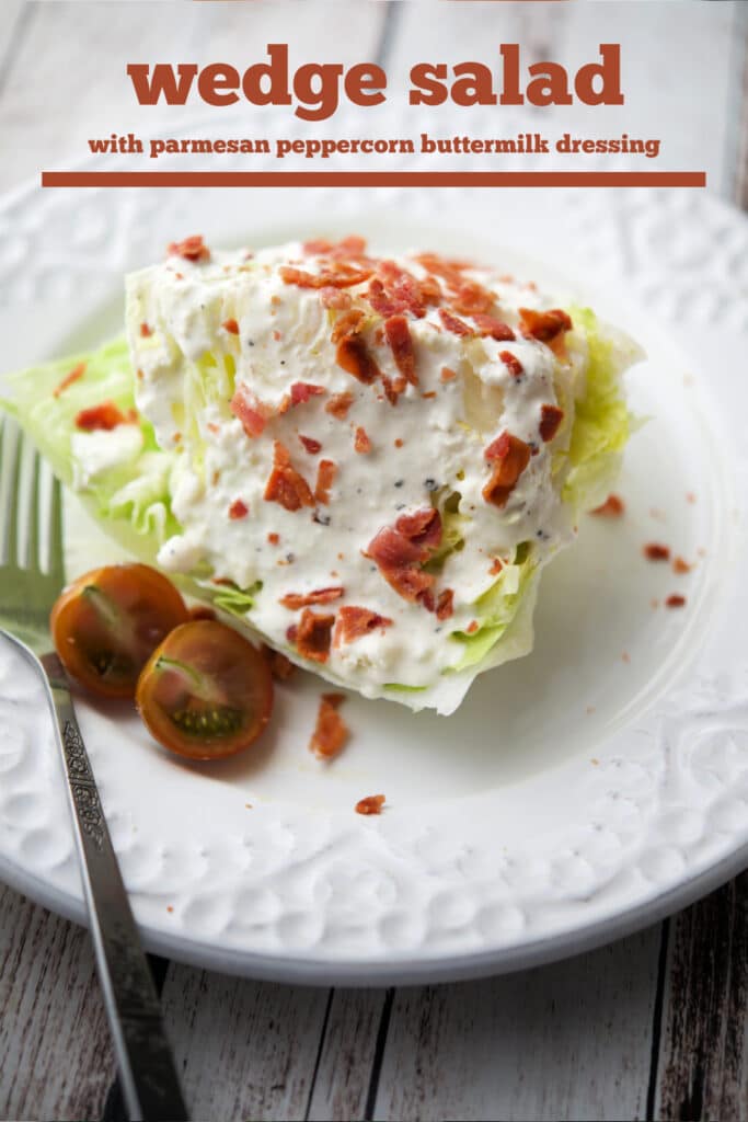 iceberg wedge salad on a white plate