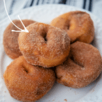 a plate of honey butter biscuit donuts