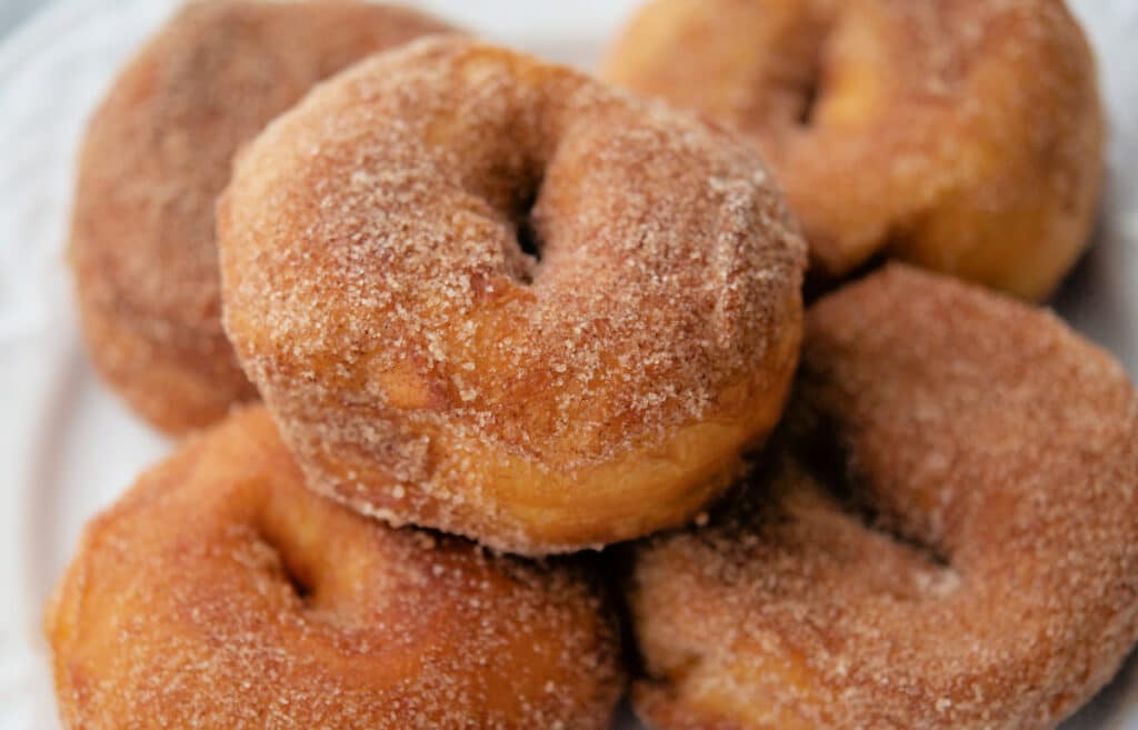 a close up of honey butter biscuit donuts