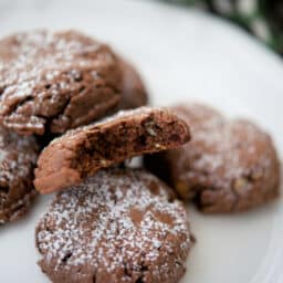 a close up of mint chocolate cookies on a plate