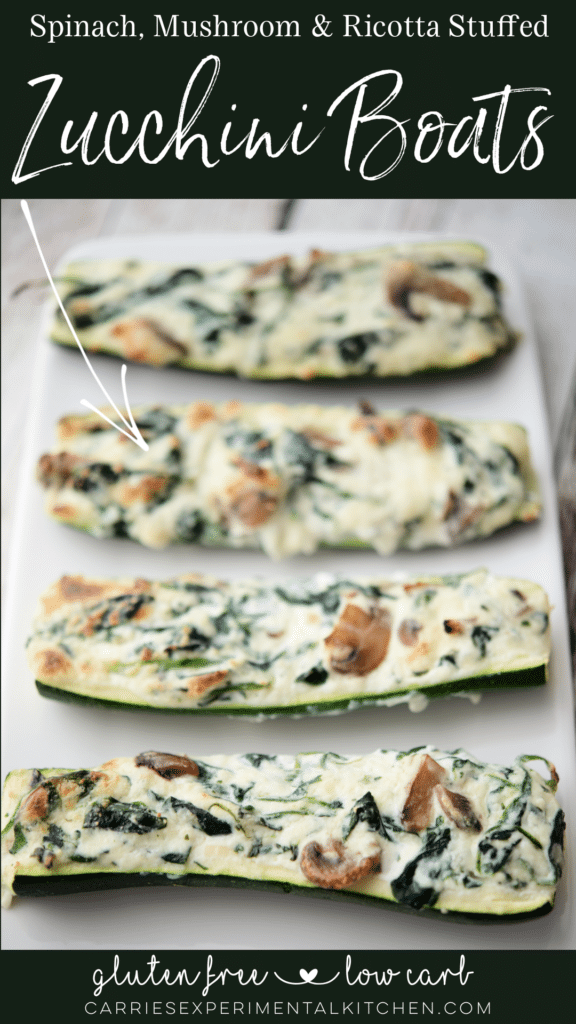 spinach mushroom and ricotta stuffed zucchini boats on a white plate