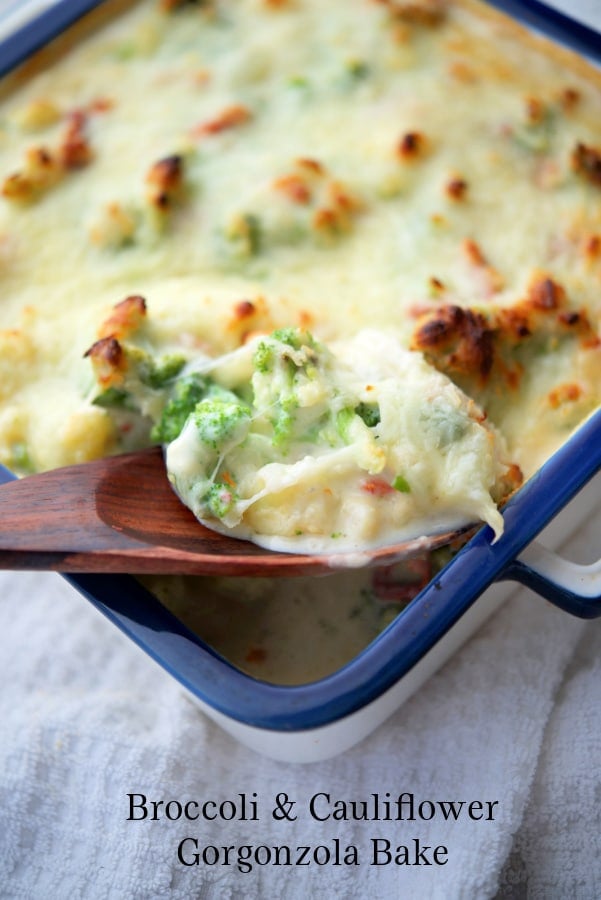 broccoli and cauliflower in a gorgonzola sauce on a spoon