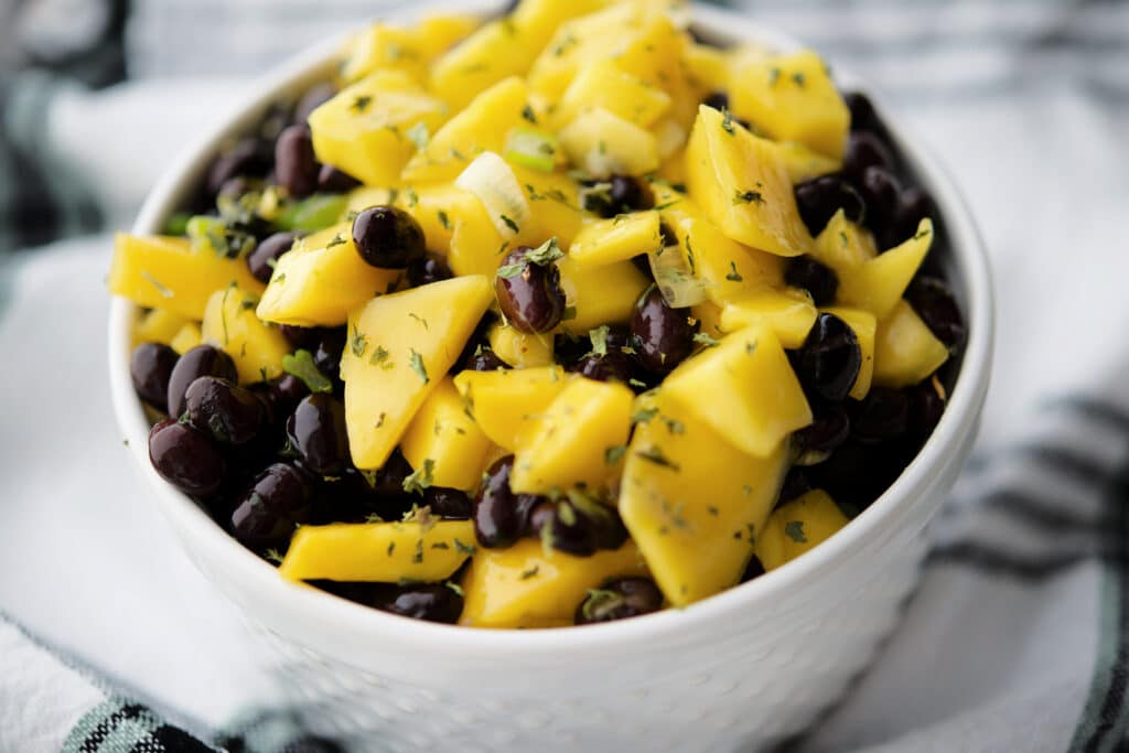 a bowl of mango black bean salsa