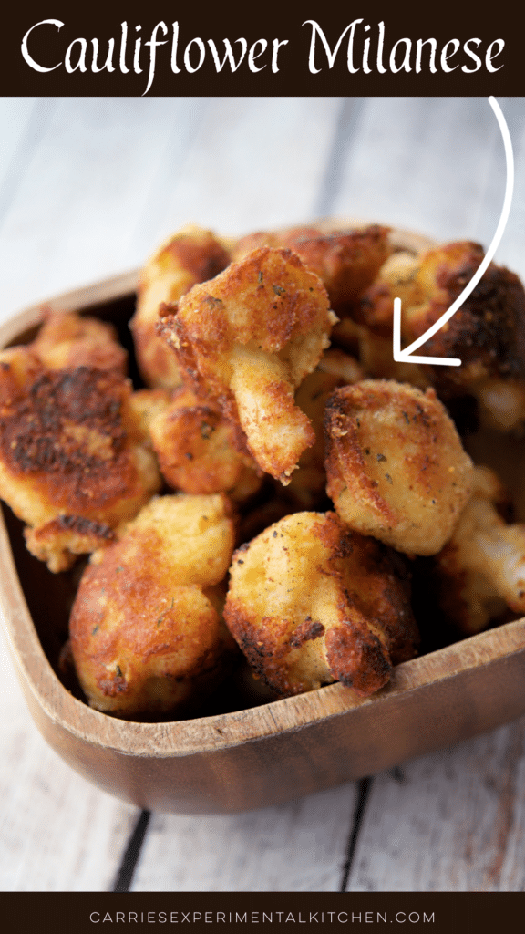 cauliflower milanese in a brown wooden bowl