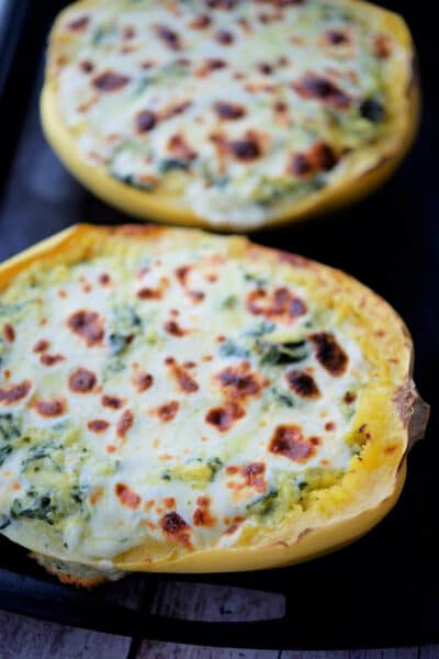 a sheet pan with spinach alfredo spaghetti squash