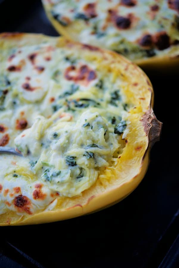 spinach alfredo spaghetti squash in squash shells