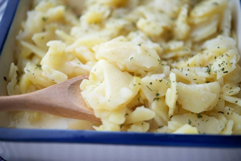 a close up of german potato salad in a dish
