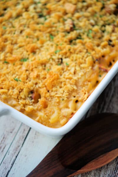 overhead picture of bbq chicken mac and cheese in a white baking dish