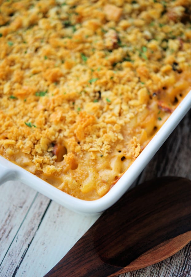 overhead picture of bbq chicken mac and cheese in a white baking dish