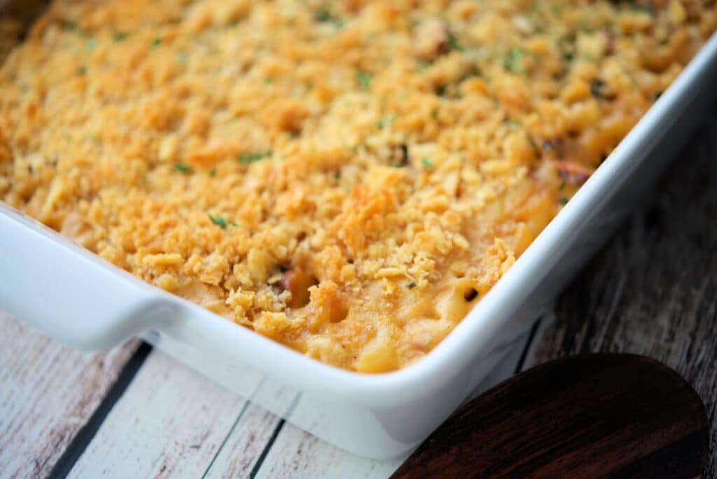 bbq mac and cheese in a white baking dish