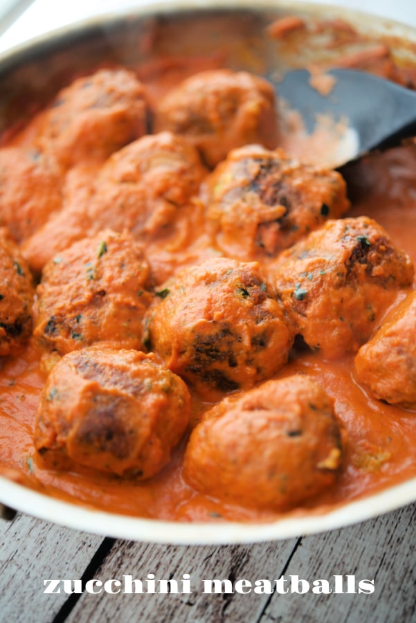 a pan with zucchini meatballs