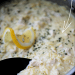 lemon garlic chicken orzo in a skillet