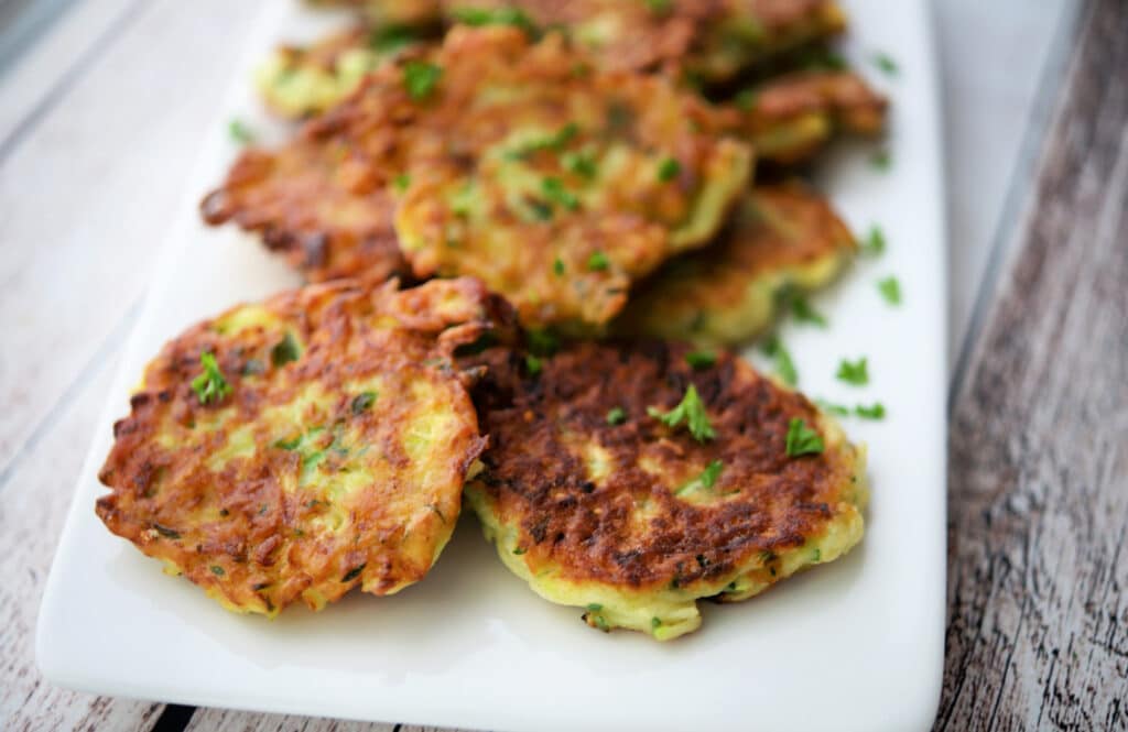 zucchini pancakes on a white dish