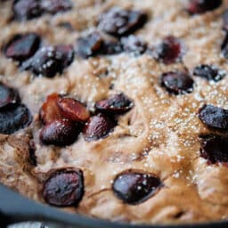 a close up of chocolate chunk cherry brownies