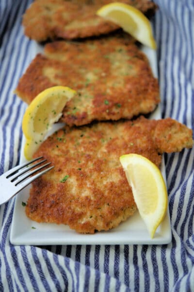 german pork cutlets on a white dish