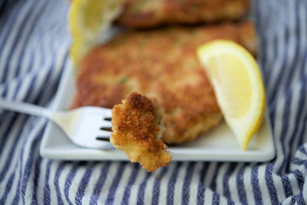 pork schnitzel on a fork
