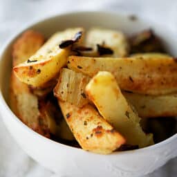 a bowl with fennel roasted potato wedges