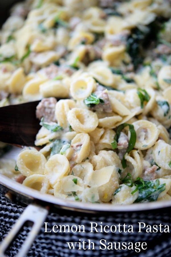 orecchiette pasta in a skillet with sausage