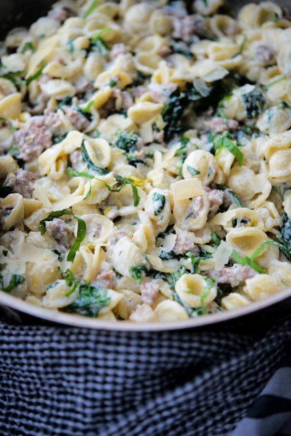 lemon ricotta pasta with sausage in a skillet