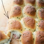 pull apart rib eye sliders on a cutting board