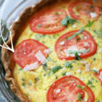 italian style tomato ricotta quiche in a pie plate