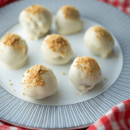 a close up of apple pie truffles on a plate