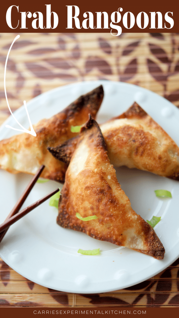 cooked crab rangoons on a white dish