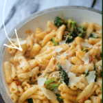 a bowl of cavatelli with broccoli in a vodka sauce