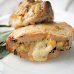 a close up of apple stuffed pork chops