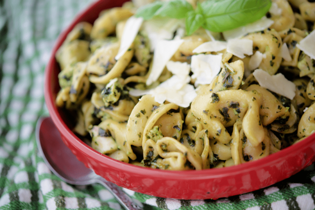 a close up of chicken pesto tortellini