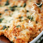 baked macaroni with ground turkey on a wooden spoon