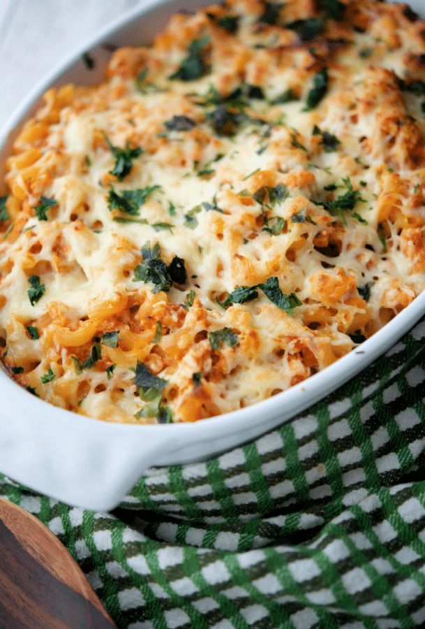 baked macaroni with ground turkey in a white dish 