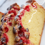 two slices of cranberry loaf bread on a white plate