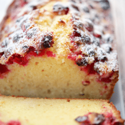 a close up of the top of the sour cream cranberry loaf