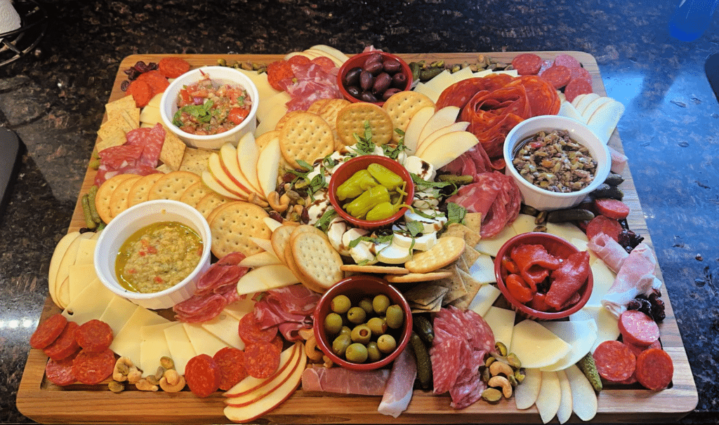 antipasto on a wooden cutting board