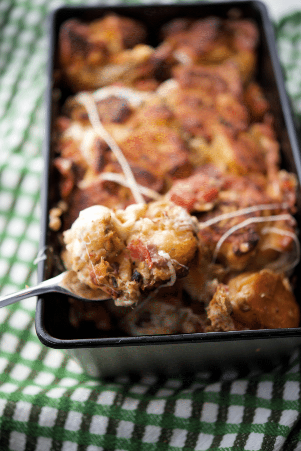 antipasto pull apart bread on a fork