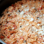 a skillet full of chicken parmesan risotto
