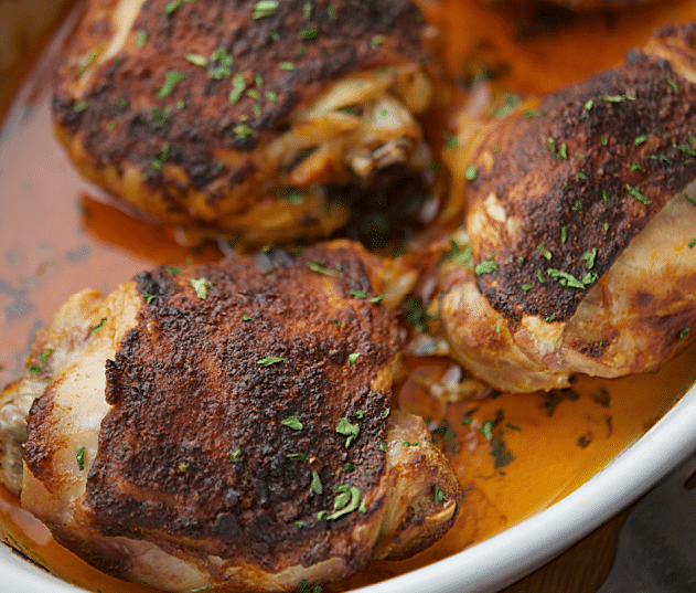 four chicken thighs roasted with paprika