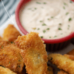 italian fried artichokes on a plate with dip