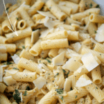 lemon pepper rigatoni with grilled chicken in a bowl