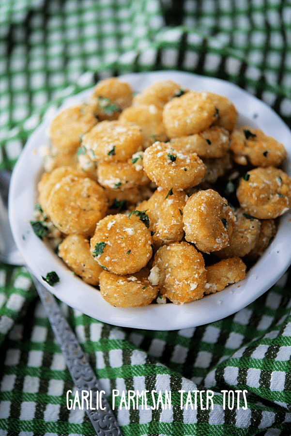 a bowl of garlic parmesan tater tots