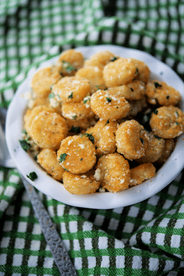 a dish of garlic parmesan tater tots