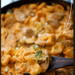 tortellini with sausage and broccoli in a pink cream sauce