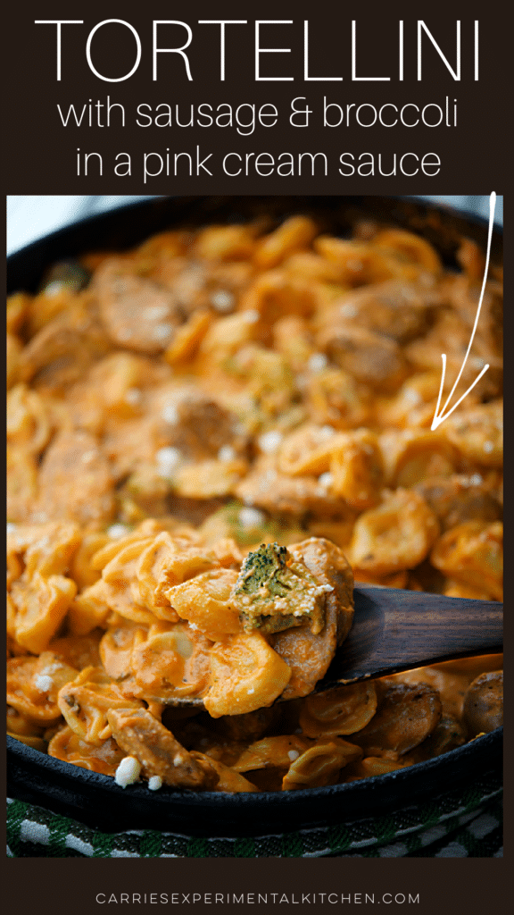 tortellini with sausage and broccoli in a pink cream sauce