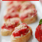 strawberry shortcake crostini on a white plate