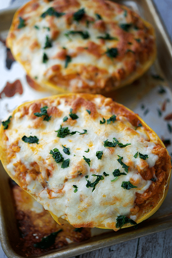 chicken parmesan spaghetti squash on a sheet pan